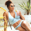 Parfait Lingerie Rita vintage-inspired bikini bottom with shirred sides and hip-level fit in Dream Blue, shown on a model.